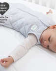 baby wrapped in weighted sleep sack