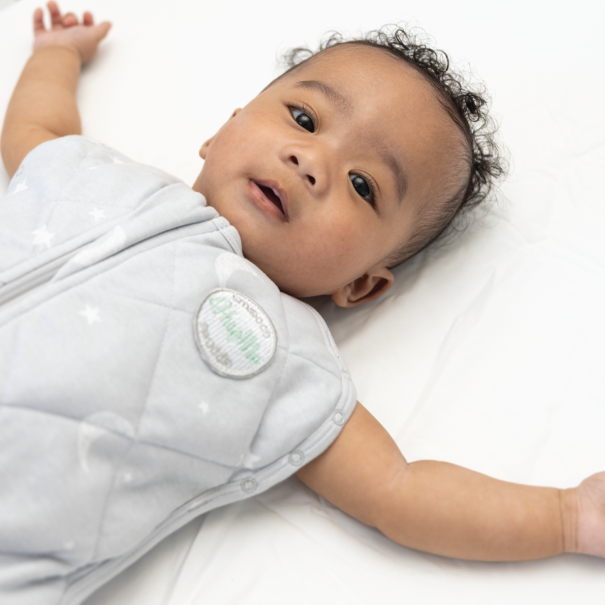 baby in weighted sleep sack