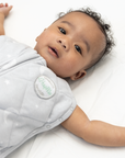 baby in weighted sleep sack