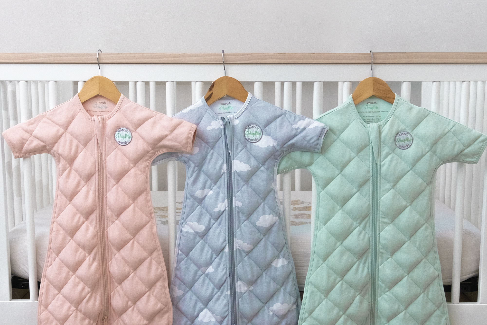 weighted sleep sack with sleeves on hangers