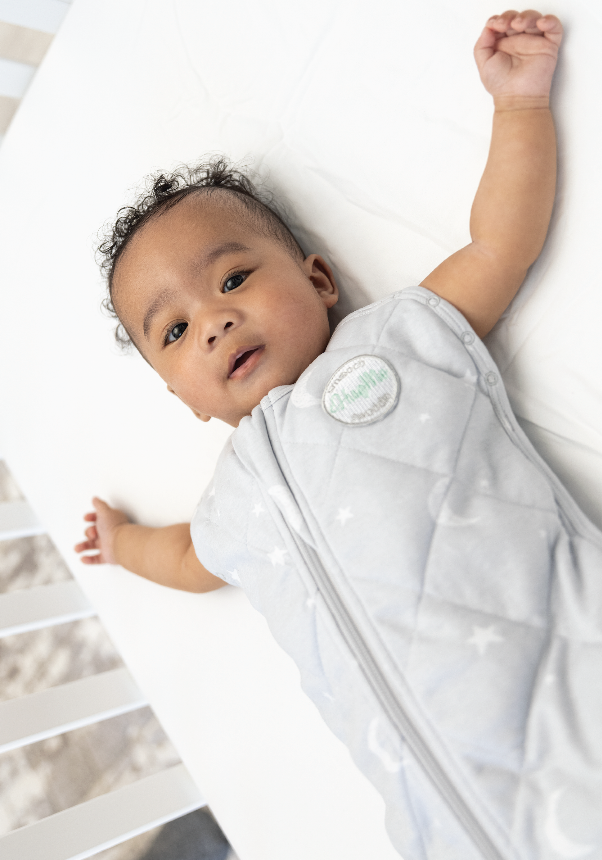 baby in weighted sleep sack